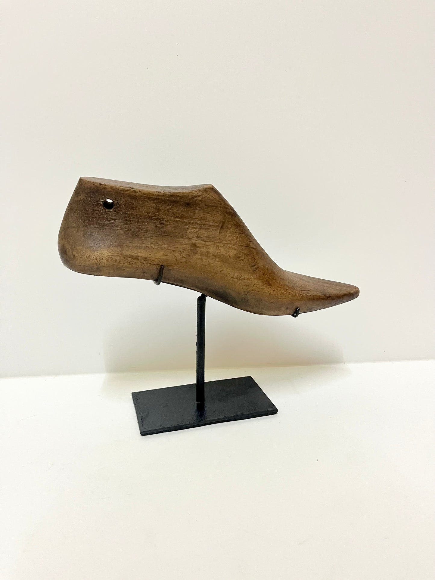 Carved Sole Story – Wooden Shoe Decor with Iron Stand | Balinese Artisan Craft