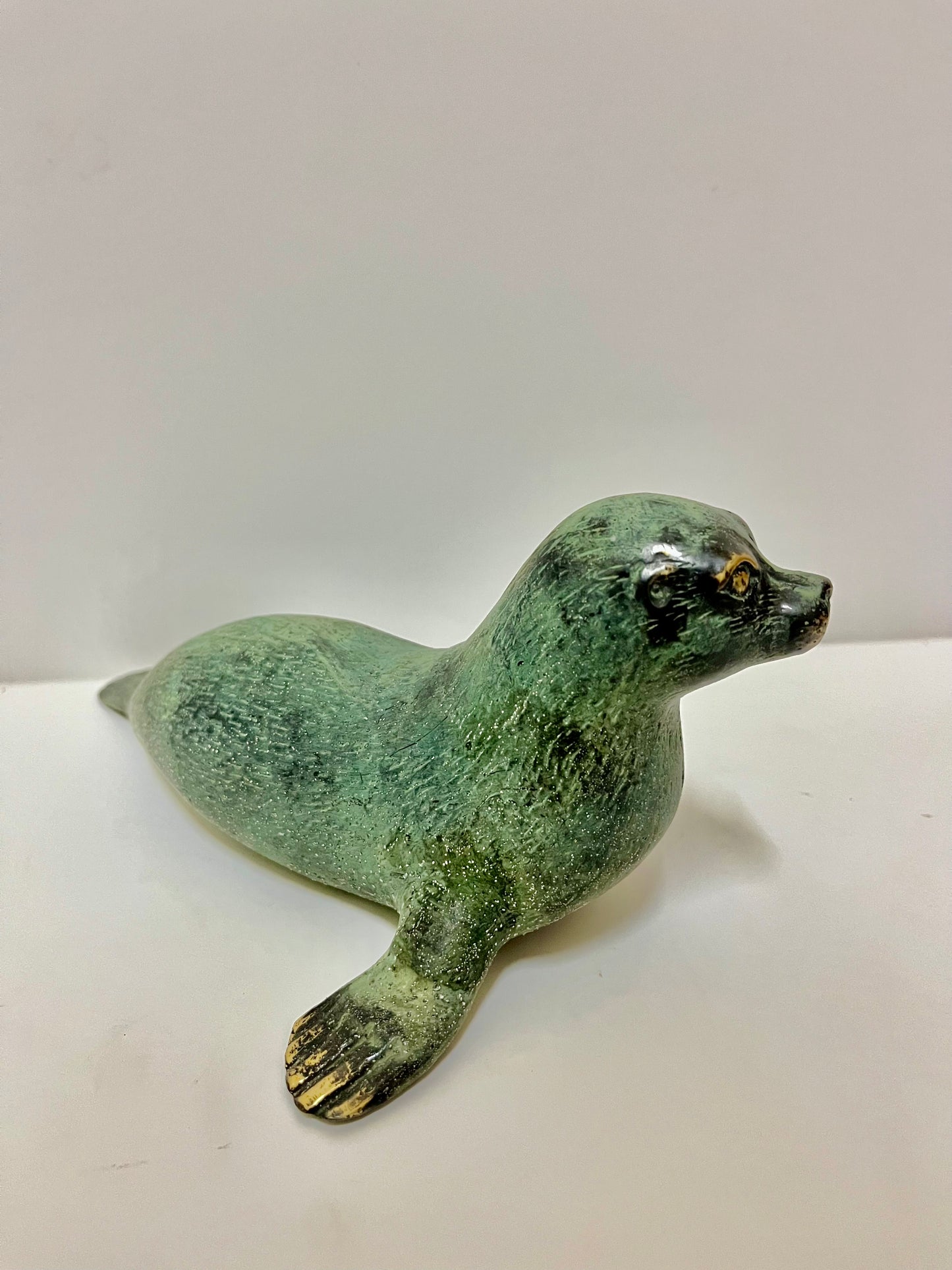 Handcrafted Bronze Sea Lion Sculpture: Balinese Marine Art Decor