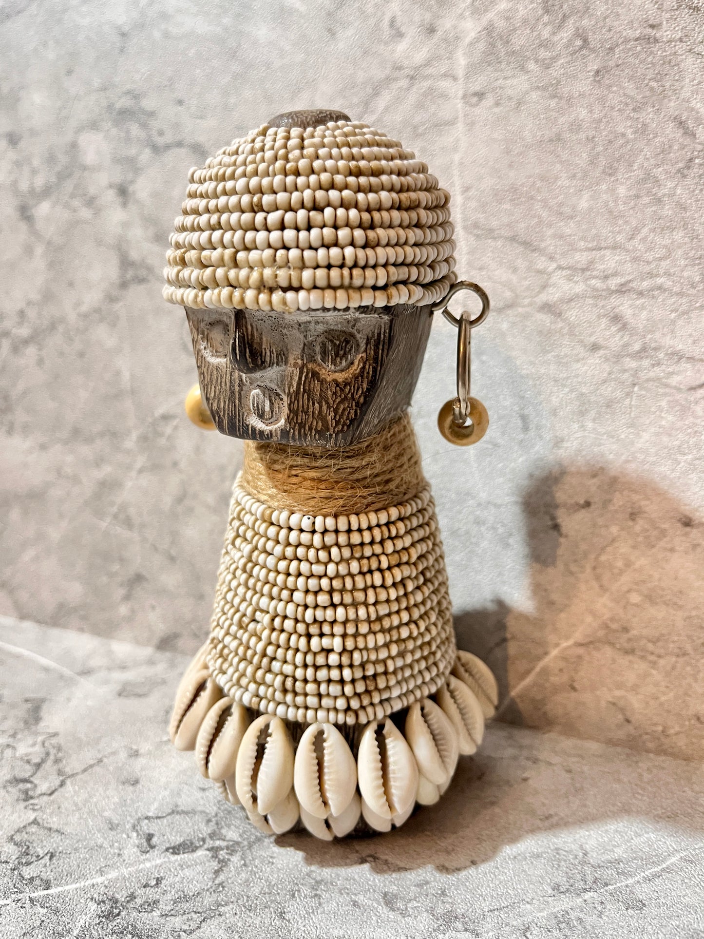Wooden Sumba Statue – Beaded Tribal Figure with Seashells | Handcrafted Island Art Decoration
