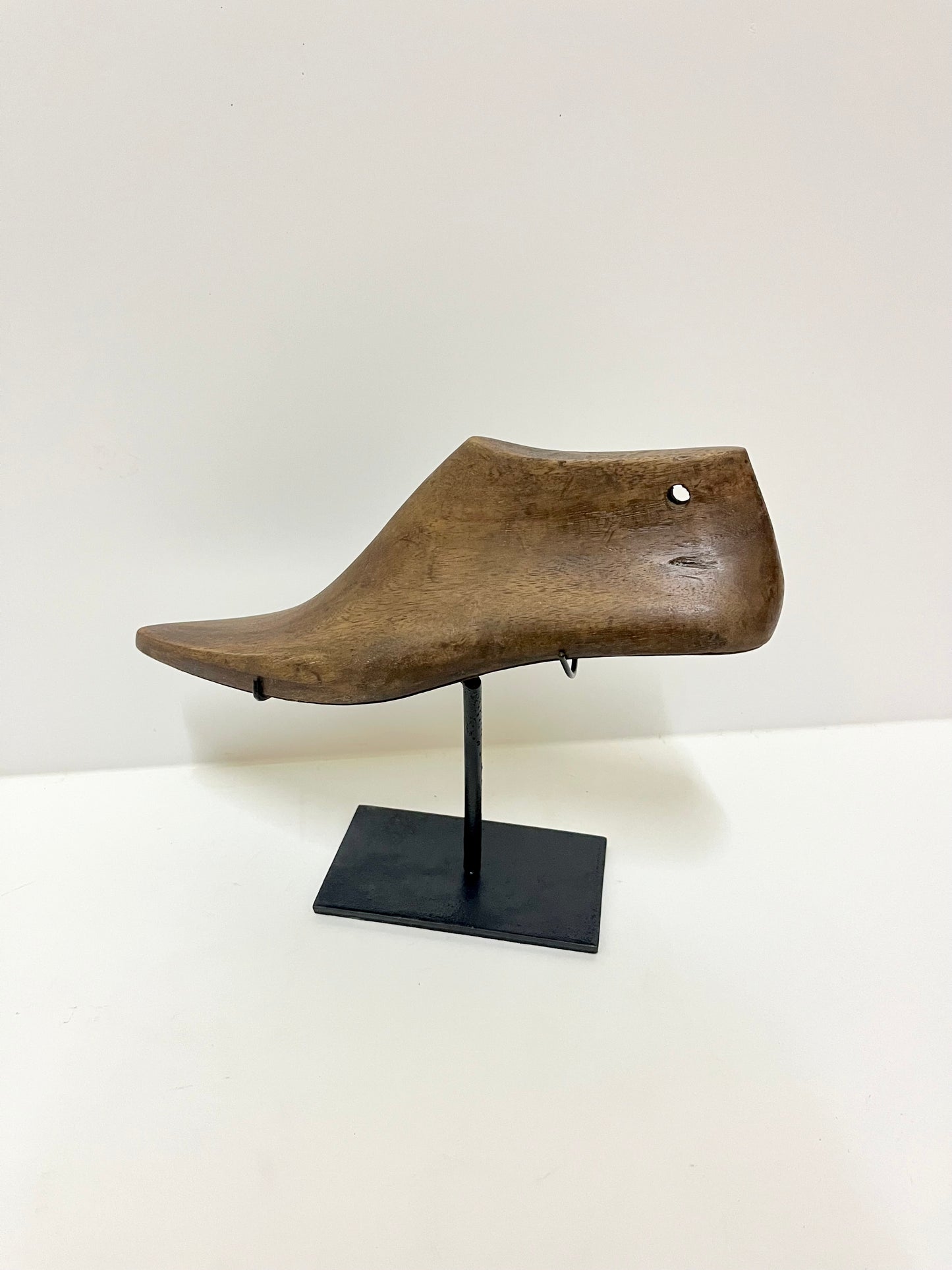 Carved Sole Story – Wooden Shoe Decor with Iron Stand | Balinese Artisan Craft