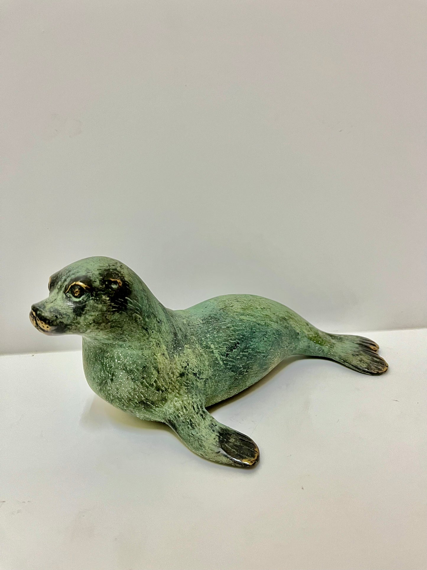 Handcrafted Bronze Sea Lion Sculpture: Balinese Marine Art Decor