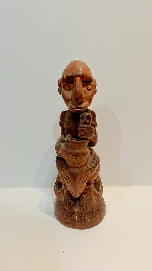 Hand-Carved Sandalwood Tribal Statue: Balinese Wood Art